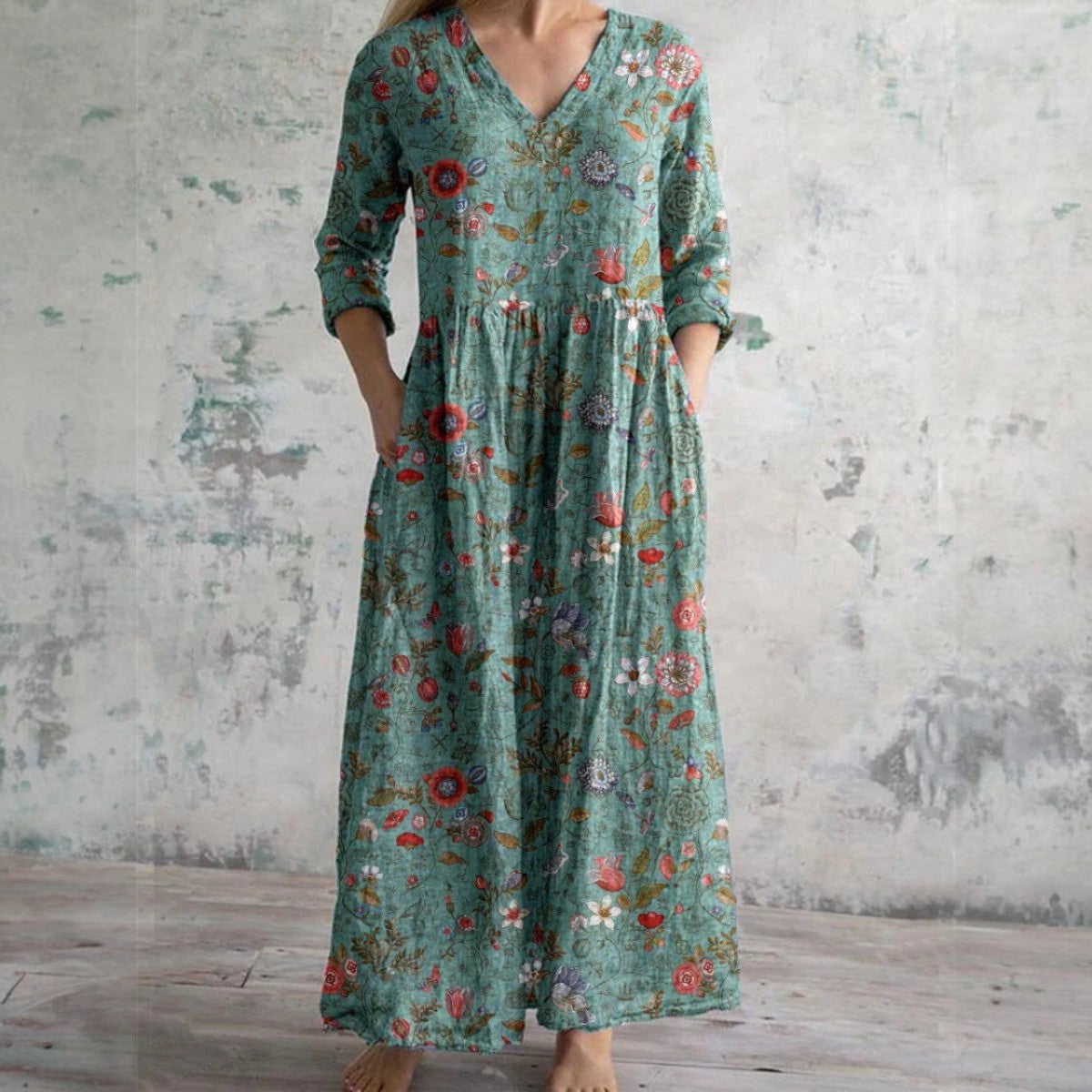 FAYE | KLÄNNING MED HALVLÅNG ÄRM OCH BLOMMÖNSTER
